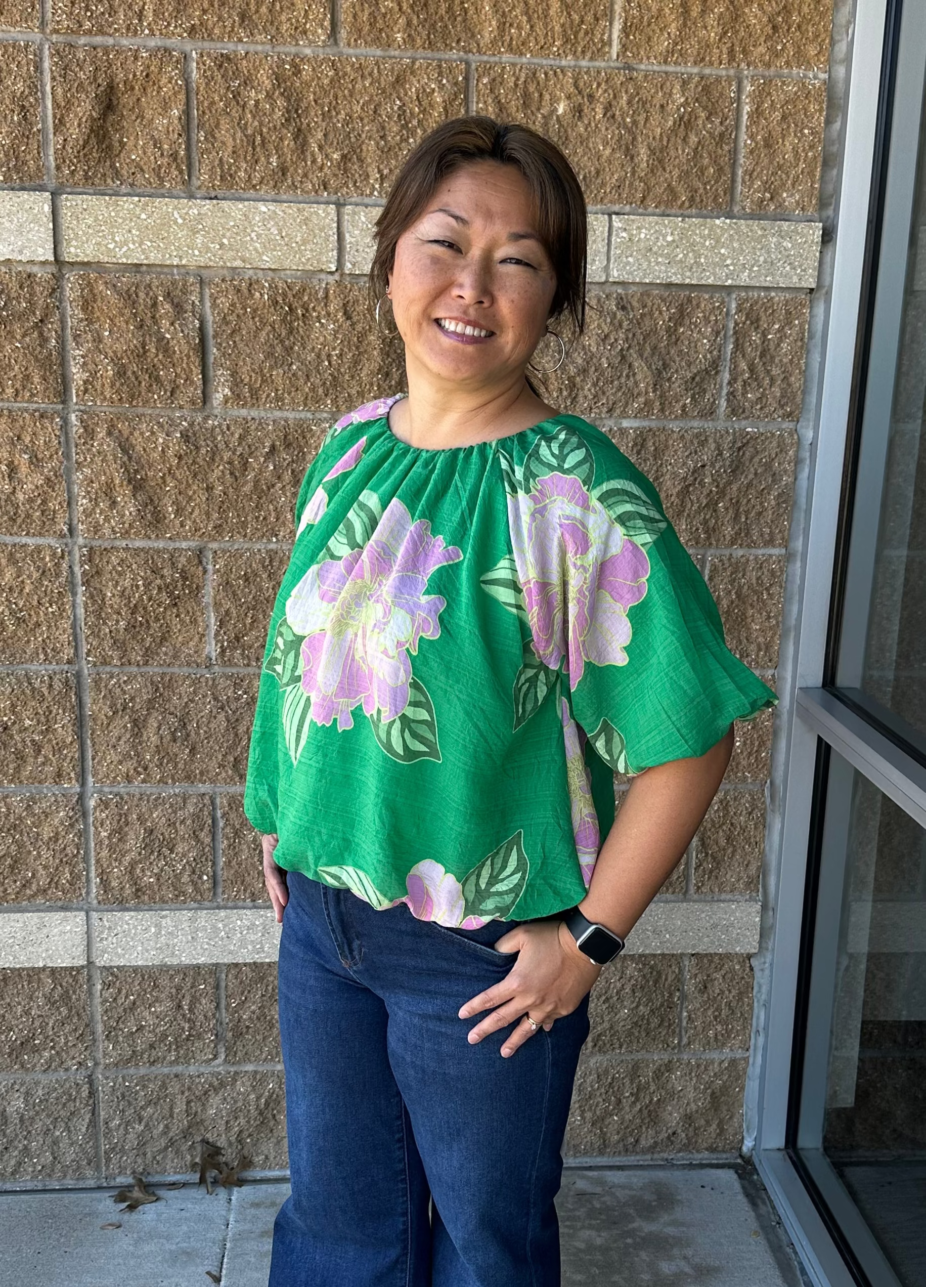 Green floral print top with bubble hem